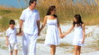 Loving Young Family on the Beach filmed at 60FPS
