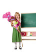 Mädchen mit Schultüte zeigt  am 1. Schultag Daumen nach oben