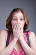 girl covered her mouth