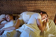 Photo: young couple sleeping in bed young couple sleeping in bed