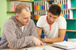 Photo: Teenage Student In Classroom With Tutor Teenage Student In Classroom With Tutor
