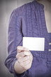 white card in female hand