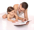 Father and daughter reading a book