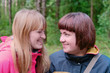 Smiling girls in forest