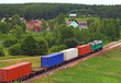 Landscape with the train and a village