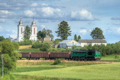 Photo: Freight train passing the village Freight train passing the village