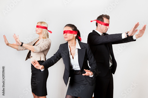 Photo: Group of disoriented businesspeople Group of disoriented businesspeople