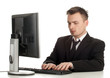 young man in black suit working on computer