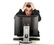 frightened young man in black suit working on computer