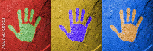 Illustration: Red Yello Blue hand prints on stone Red Yello Blue hand prints on stone
