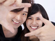 Closeup of a smiling young woman and man Closeup of a smiling young woman and man