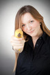 Image of girl holds banana as a gun Image of girl holds banana as a gun