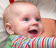 baby laughing and playing