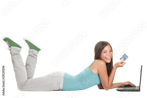 Photo: Young woman internet shopping on laptop Young woman internet shopping on laptop