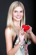 Pretty young woman with red heart Pretty young woman with red heart