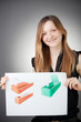 Young Design Engineer Woman Shows a Design Plan Young Design Engineer Woman Shows a Design Plan