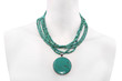 Green necklace on a mannequin Green necklace on a mannequin