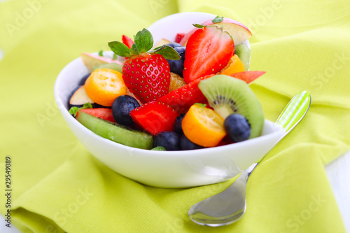 Photo: Fruity summer salad in white bowl Fruity summer salad in white bowl