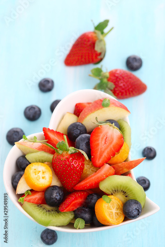 Photo: Fruity summer salad in white bowl Fruity summer salad in white bowl