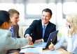Business people shaking hands, finishing up a meeting