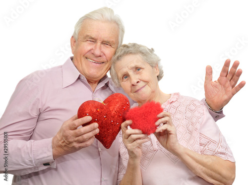 Foto: happy old couple with red hearts happy old couple with red hearts