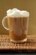 Coffee with marshmallows in large glass beaker