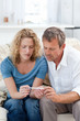 Lovers looking at a pregnancy test