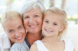Portrait of a joyful family looking at the camera