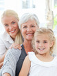 Portrait of a joyful family looking at the camera Portrait of a joyful family looking at the camera