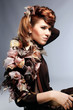 Foto: Face of beautiful caucasian brunet woman in brown elegant dress Face of beautiful caucasian brunet woman in brown elegant dress