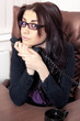 Foto: Businesswoman sitting in office Businesswoman sitting in office