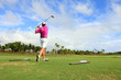 golf player teeing golf player teeing