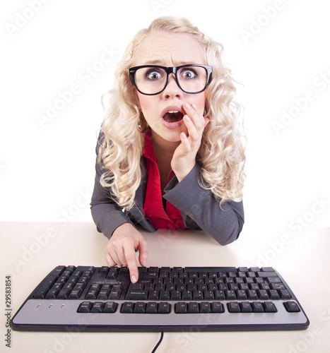 Photo: Shocked girl at a computer Shocked girl at a computer