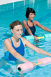 Water exercising with aqua dumbbell