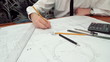 young engineer works with drawings. HD dolly.