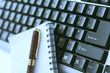 The keyboard and note book The keyboard and note book
