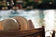 Video: Woman with a hat relaxing at the pool Woman with a hat relaxing at the pool