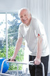 Happy man with a walker