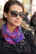 Pretty young woman at an outdoor cafe
