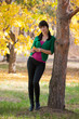 girl resting on yellow autumn leaves girl resting on yellow autumn leaves