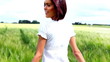Happy young beautiful woman on cereal field in summer - Outdoor