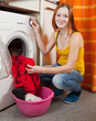 woman loading the washing machine