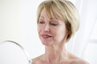 Mature Woman Making Up