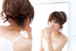 a portrait of beautiful asian woman brushing teeth