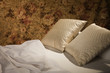 Messy luxurious bed with pillow