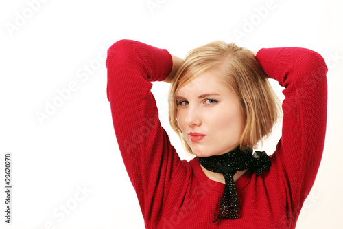 Photo: Pretty girl listening looking skeptical Pretty girl listening looking skeptical