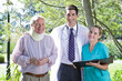 Happy patient with medics