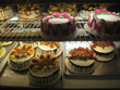Photo: Colorful Cakes in Bakery Window Display Colorful Cakes in Bakery Window Display