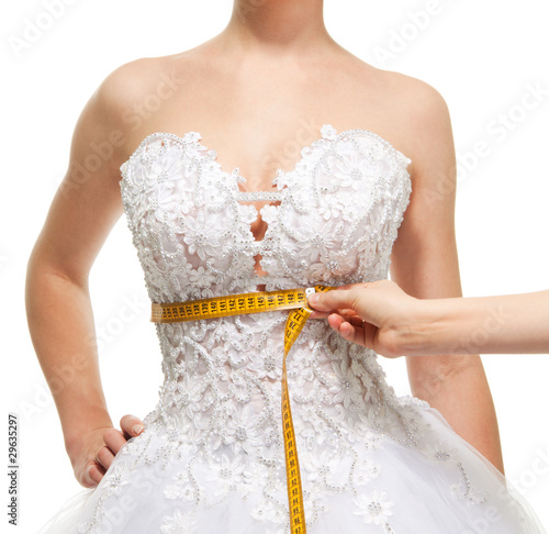Photo: Measuring woman's waist under the breast Measuring woman's waist under the breast