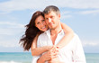 embracing summer couple